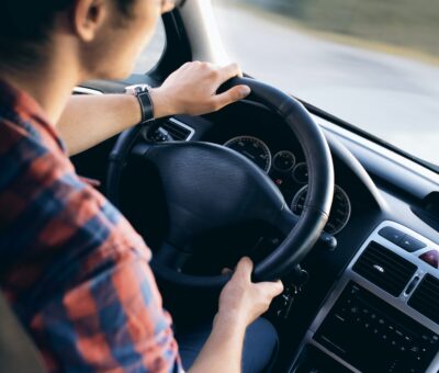 The boy is driving a car arabic translation abu dhabi driving license